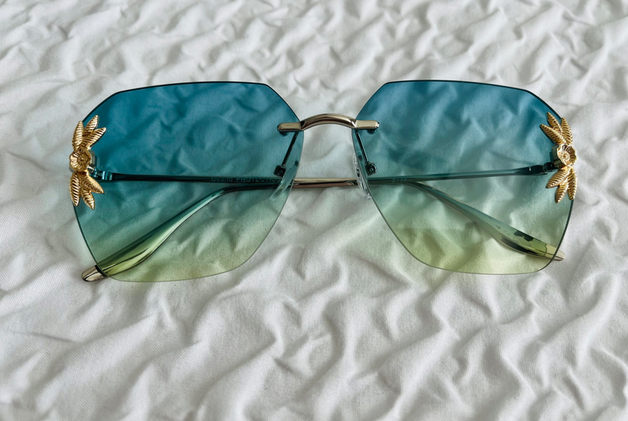 Women's Sunglasses/Flower Accent on Lens
